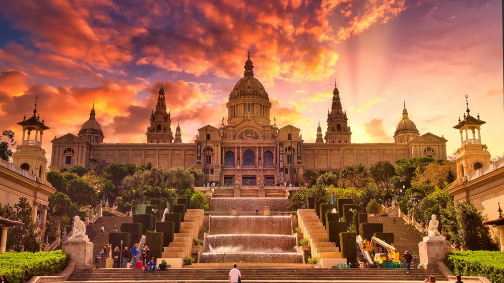 Palau Nacional and Montjuïc fountains in Barcelona at sunset